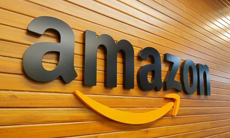 amazon halved corporation tax bill despite uk profits tripling